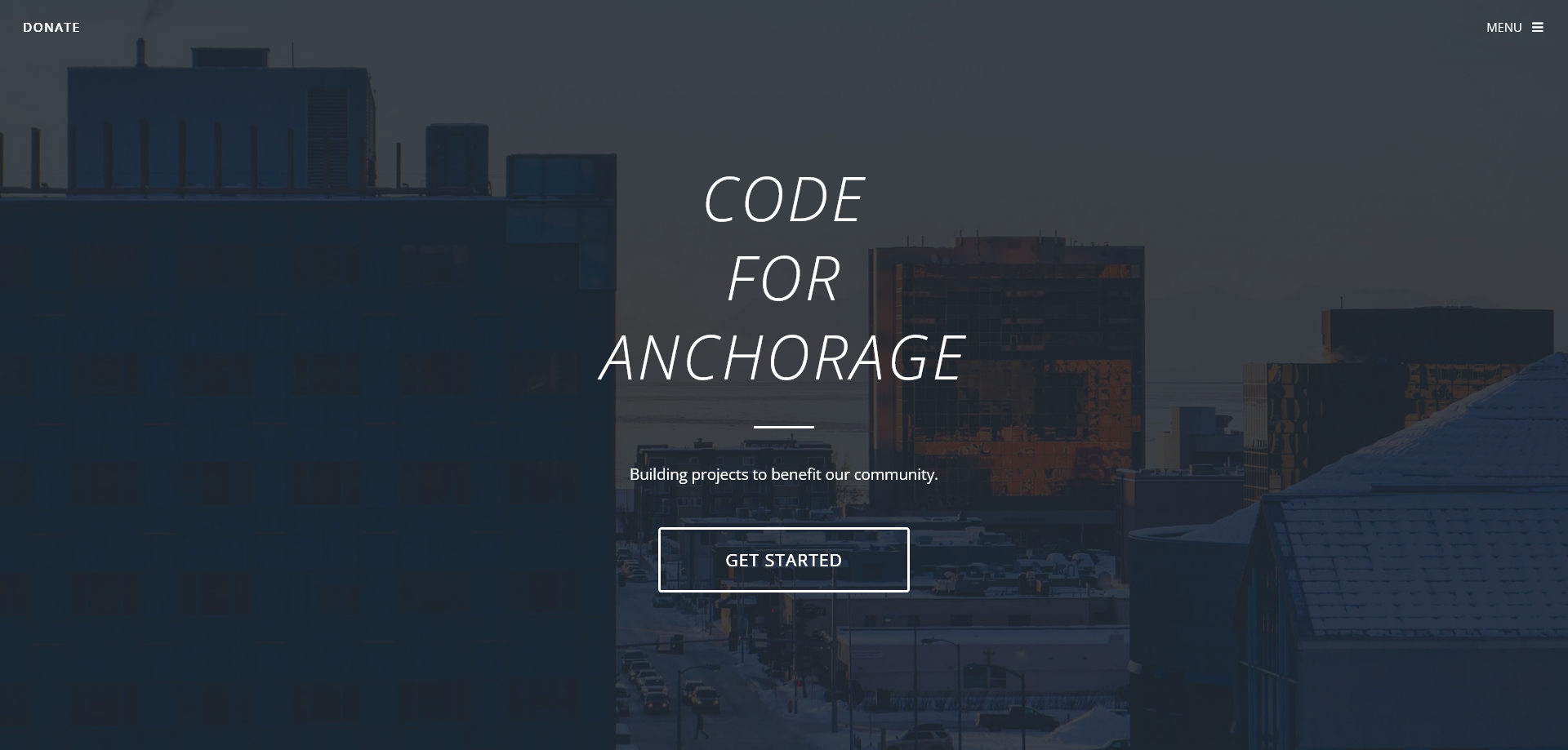 Code for Anchorage landing page with a background image of Downtown Anchorage on 6th street.